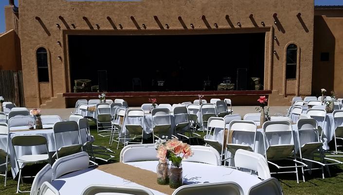 This photo captures a beautiful outdoor setup with the stage front & center.